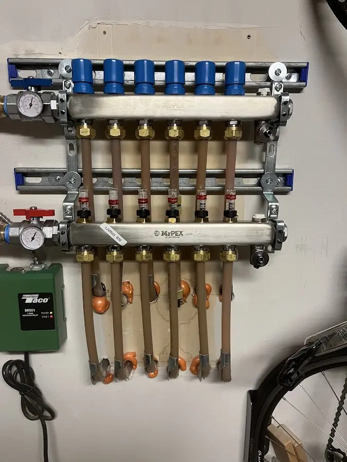 Plumber performing Water Heater Repair at a residential property in Dickson